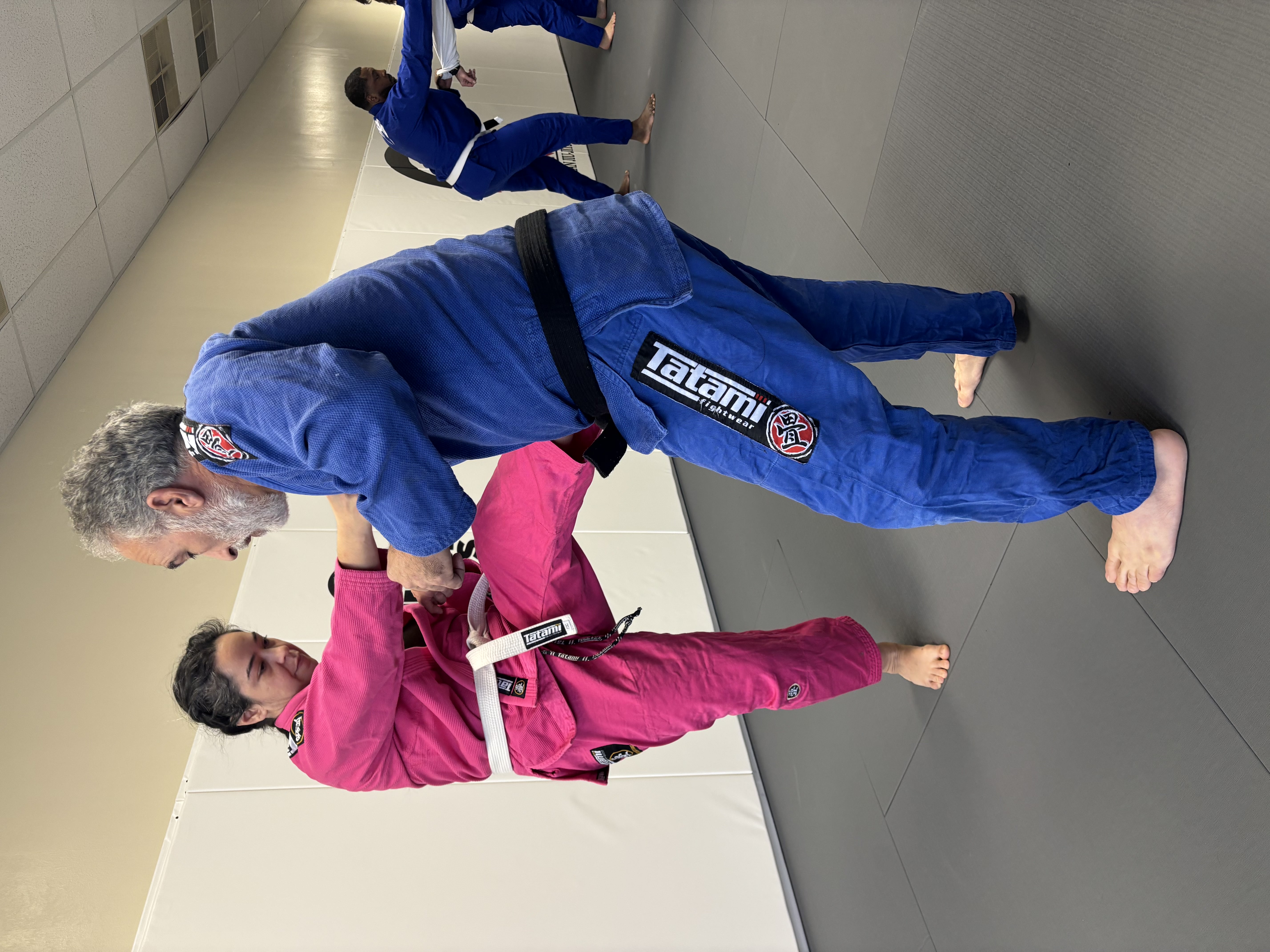 Belt stripe test with students in colored gis at ZEN Brazilian Jiu-Jitsu