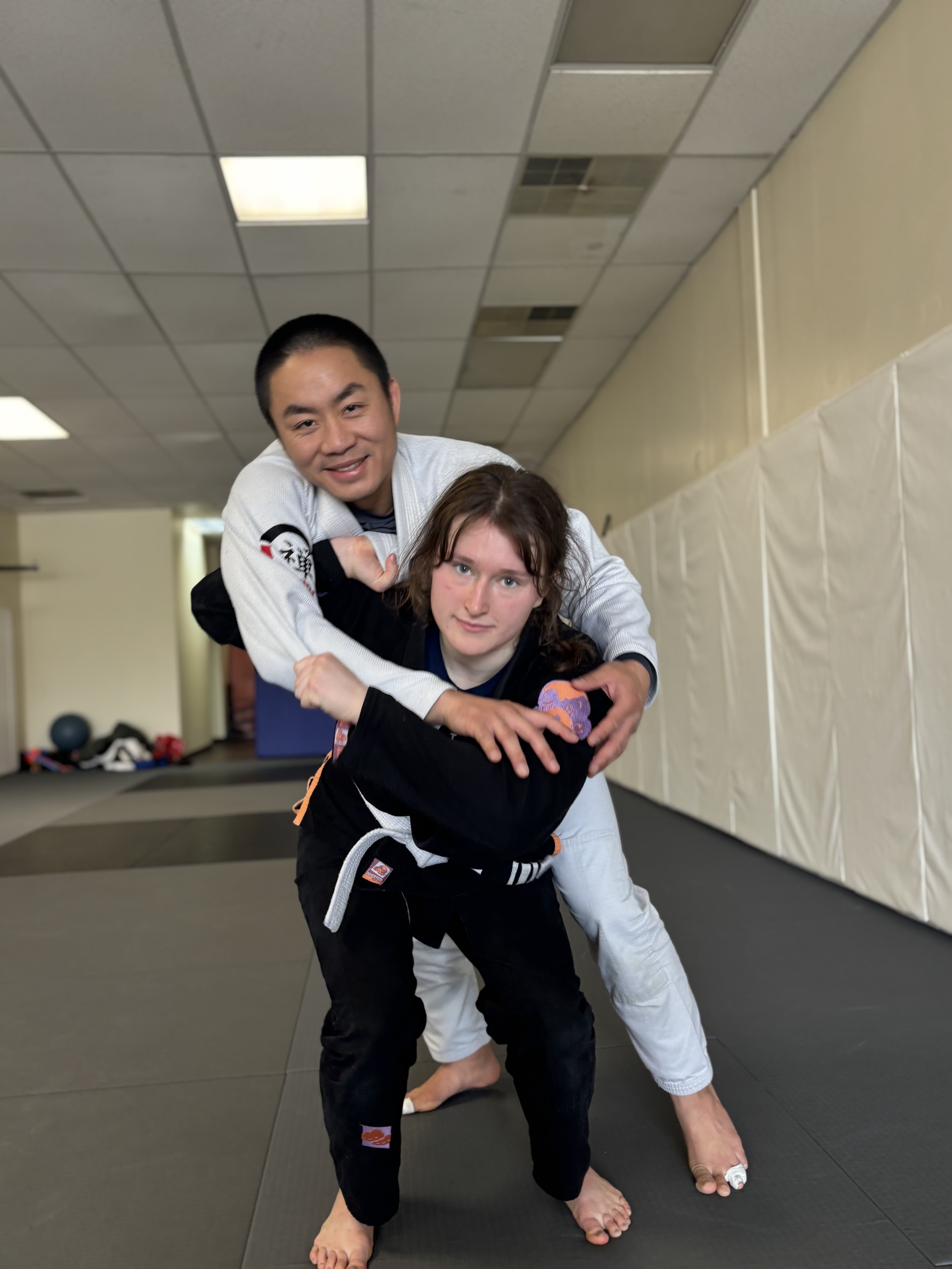 Kids Jiu-Jitsu class with instructor and young student at ZEN Brazilian Jiu-Jitsu