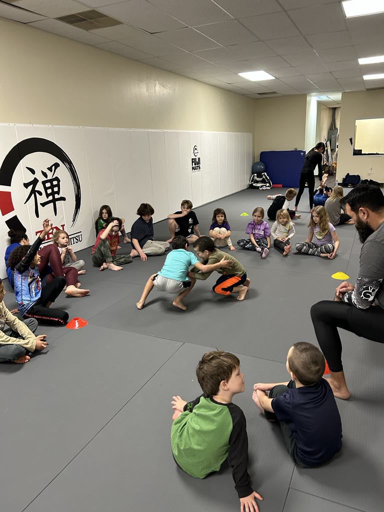 Kids Brazilian Jiu-Jitsu class with young students at ZEN BJJ