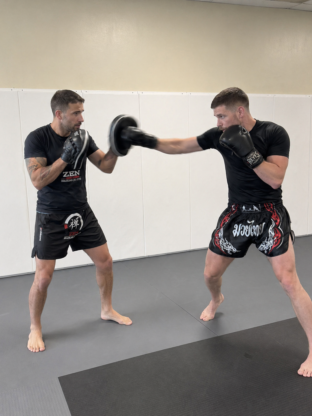 ZEN Kickboxing students drilling pad work during a class in Coopersburg, PA